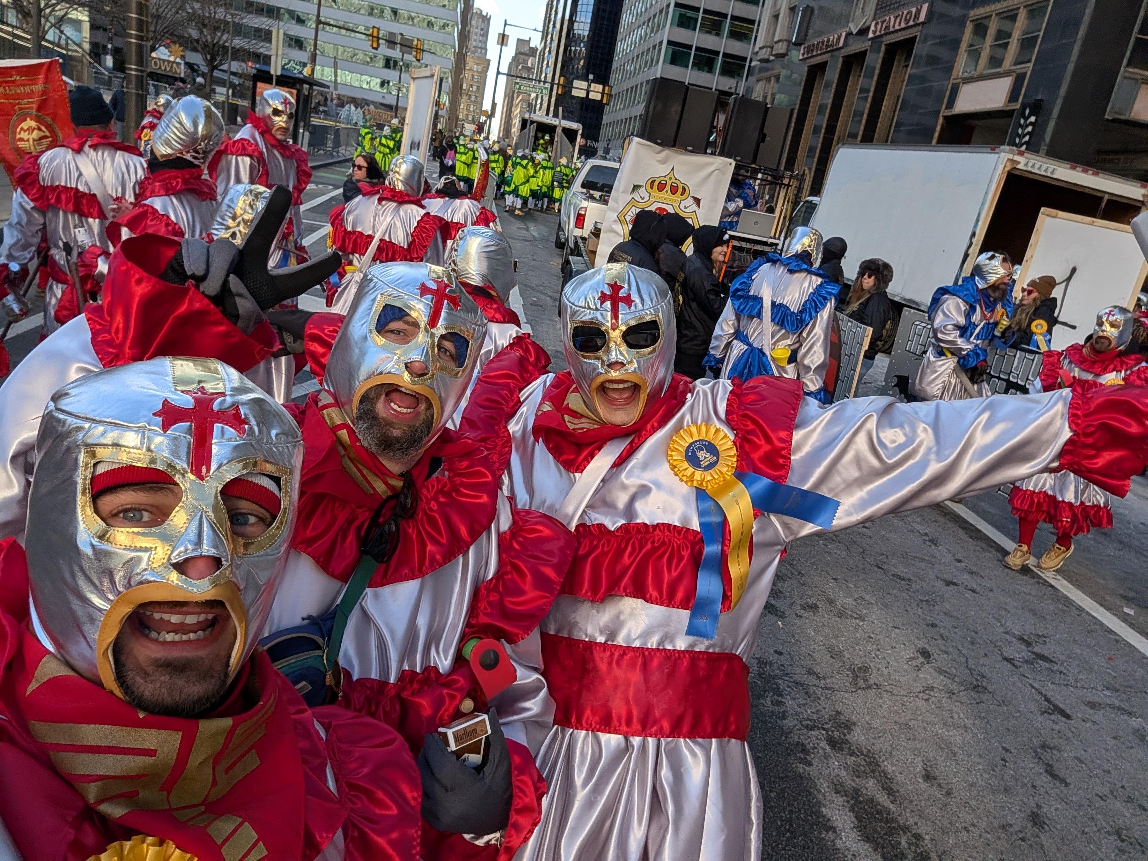 Costumed Mummers celebrating together on a Philadelphia street